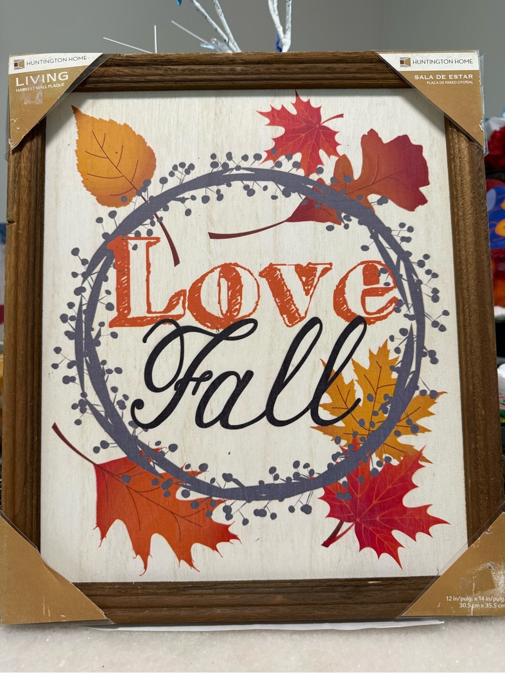 This Love Fall Faux Wood Framed Home Decor is a medium-sized plaque featuring a